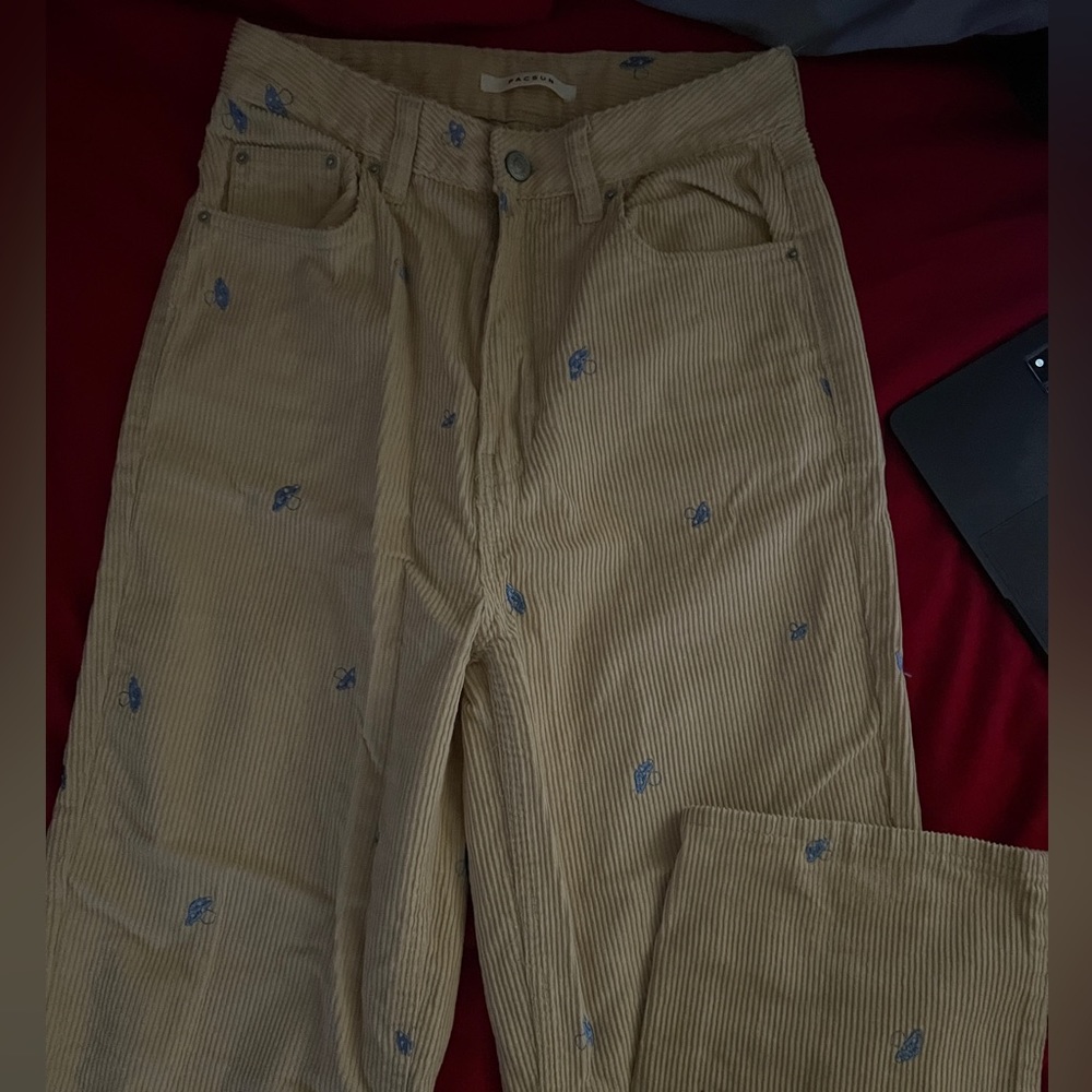 Cream pants with little mushrooms
